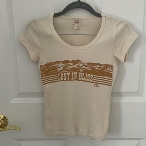 Billabong Wrangler cream tee.